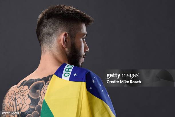 Matheus Nicolau of Brazil poses for a portrait backstage after his victory over Louis Smolka during the UFC 219 event inside T-Mobile Arena on...