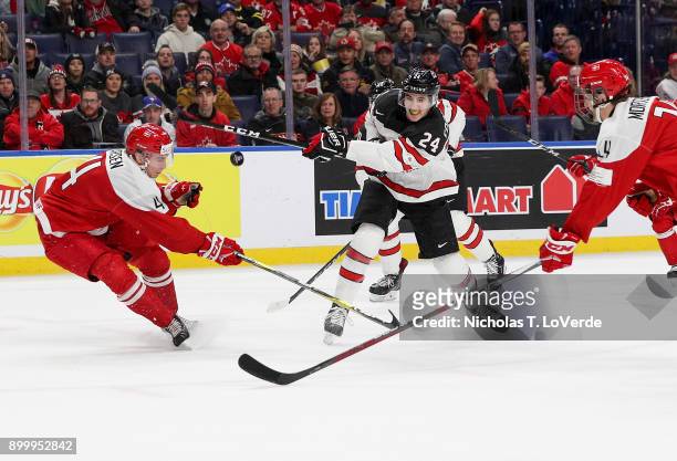 Alex Formenton of Canada shoots the puck past Christian Larsen of Denmark during the first period of play in the IIHF World Junior Championships at...