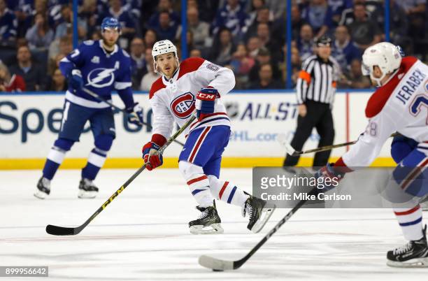 Andrew Shaw of the Montreal Canadiens looks for a pass against the Tampa Bay Lightning during the second period at Amalie Arena on December 28, 2017...