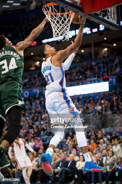 Andre Roberson of the Oklahoma City Thunder goes to the basket against the Milwaukee Bucks on December 29, 2017 at Chesapeake Energy Arena in...