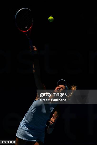 Eugenie Bouchard of Canada serves to Daria Gavrilova of Australia in her singles match on day 2 of the 2018 Hopman Cup at Perth Arena on December 31,...