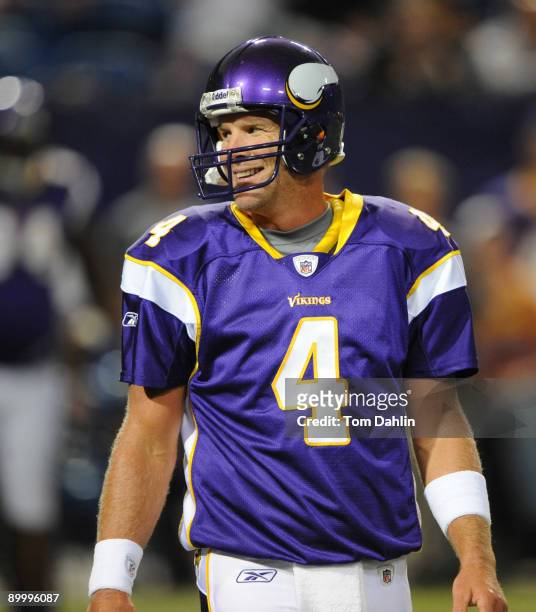 Brett Favre of the Minnesota Vikings looks back to the bench during warmups prior to an NFL game against the Kansas City Chiefs at the Hubert H....
