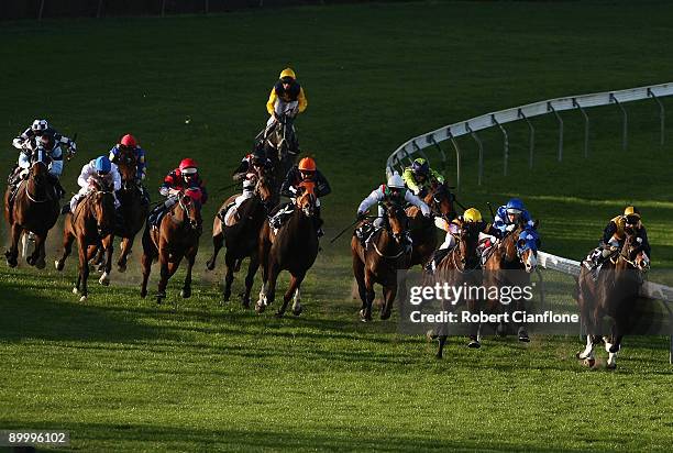 The field in race eight round the home turn during race eight the the Castello's Group 0-89 Handicap at Moonee Valley Racecourse on August 22, 2009...