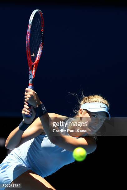Eugenie Bouchard of Canada plays a backhand to Daria Gavrilova of Australia in her singles match on day 2 of the 2018 Hopman Cup at Perth Arena on...