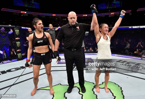 Carla Esparza celebrates her unanimous-decision victory over Cynthia Calvillo in their women's strawweight bout during the UFC 219 event inside...