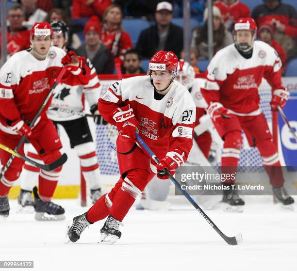 Phillip Schultz of Denmark skates against Canada during the second period of play in the IIHF World Junior Championships at the KeyBank Center on...