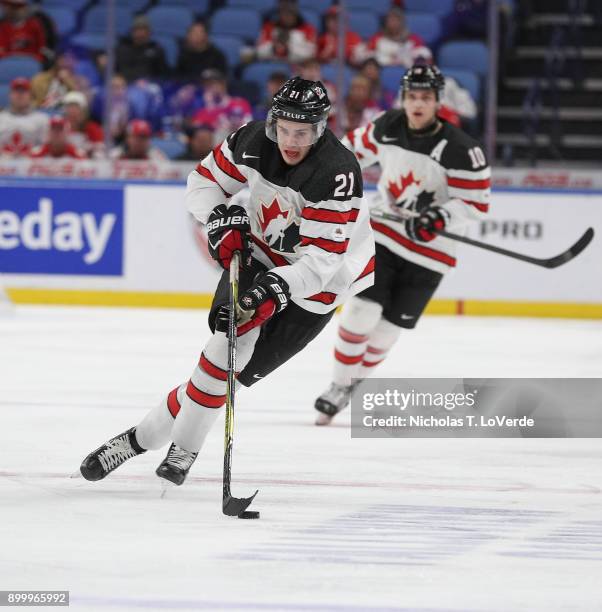 Brett Howden of Canada skates up ice with the puck during the third period of play in the IIHF World Junior Championships at the KeyBank Center on...