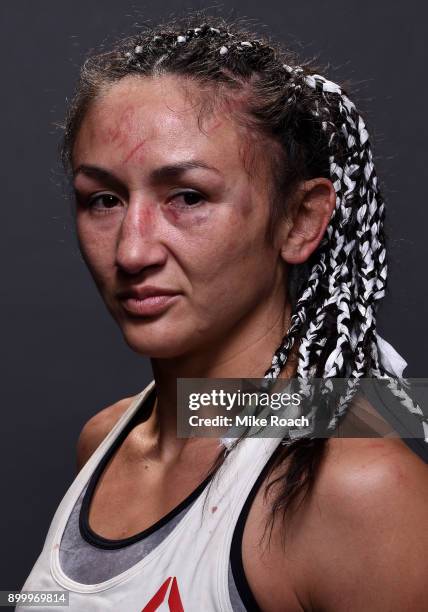 Carla Esparza poses for a portrait backstage after her victory over Cynthia Calvillo during the UFC 219 event inside T-Mobile Arena on December 30,...