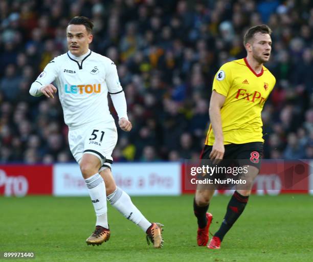 Swansea City's Roque Mesa and Watford's Tom Cleverley during Premier League match between Watford and Swansea City at Vicarage Road Stadium, Watford...