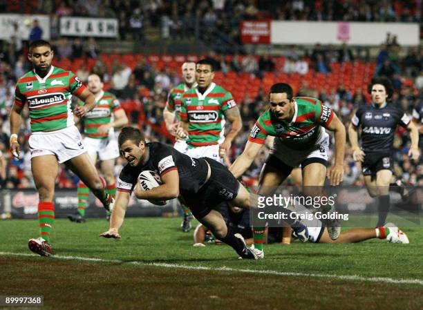 Wade Graham of the Panthers dives over to score during the round 24 NRL match between the Penrith Panthers and the South Sydney Rabbitohs at CUA...