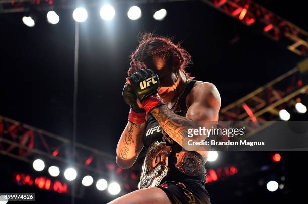 Cris Cyborg of Brazil celebrates after her victory over Holly Holm in their women's featherweight bout during the UFC 219 event inside T-Mobile Arena...