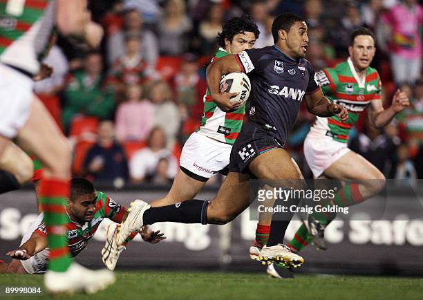 Michael Jennings of the Panthers breaks away and scores during the round 24 NRL match between the Penrith Panthers and the South Sydney Rabbitohs at...
