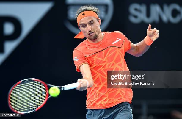 Alexandr Dolgopolov of Ukraine plays a forehand in his match against Diego Schwartzman of Argentina during day one at the 2018 Brisbane International...