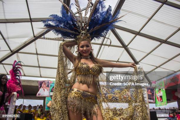 Woman seen participating with the other prisoners behind her during the contest of miss sympathy in the Buen Pastor jail.