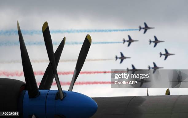 French aerobatics team Patrouille de France performs during the MAKS 2009 international aerospace show outside Moscow in Zhukovsky on August 22,...