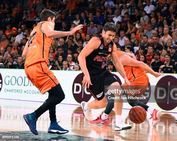 Damian Martin of the Wildcats drives to the basket during the round 12 NBL match between the Cairns Taipans and the Perth Wildcats at Cairns...