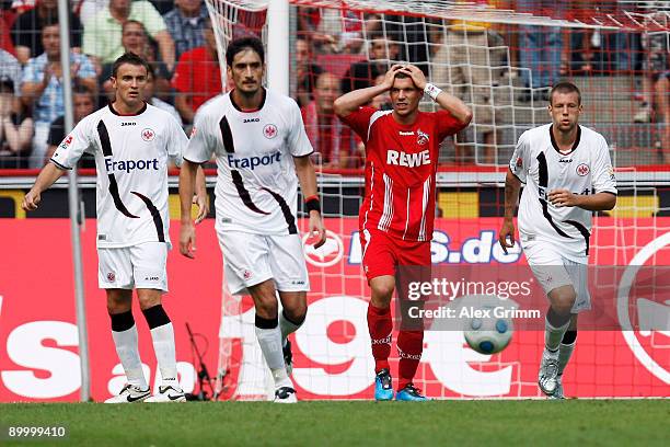 Lukas Podolski of Koeln reacts during the Bundesliga match between 1. FC Koeln and Eintracht Frankfurt at the Rhein Energie Stadium on August 22,...