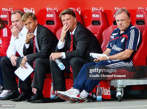 Sporting director Christian Nerlinger, assistant coach Andries Jonker, head coach Louis van Gaal of Bayern and assistant coach Hermann Gerland look...