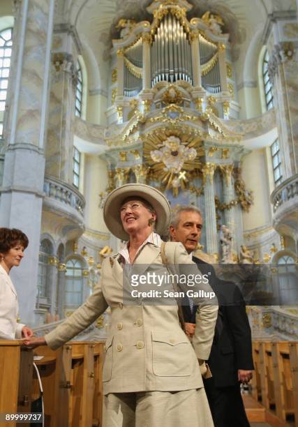 Queen Margrethe II of Denmark, accompanied by Saxony Governor Stanislaw Tillich and his wife Veronika, visits the Frauenkirche Cathedral on August...