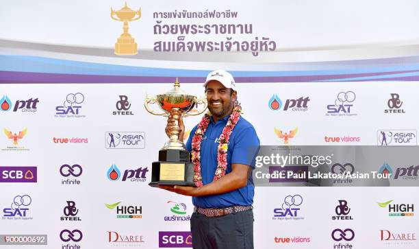 Shiv Kapur of India pictured with the winner's trophy after the final round of the Royal Cup at the Phoenxi Gold GCC on December 31, 2017 in Pattaya,...