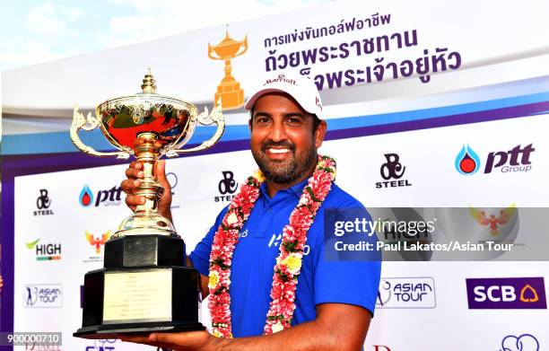 Shiv Kapur of India pictured with the winner's trophy after the final round of the Royal Cup at the Phoenxi Gold GCC on December 31, 2017 in Pattaya,...