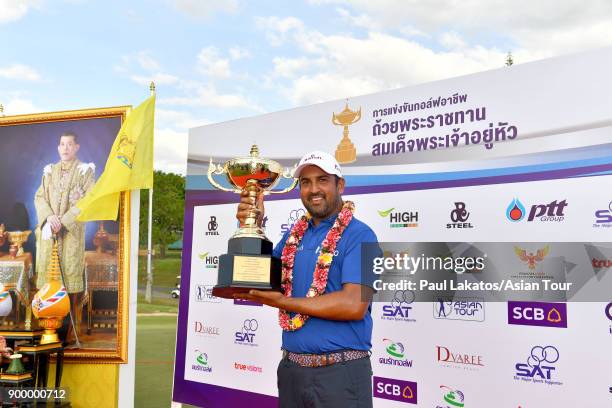 Shiv Kapur of India pictured with the winner's trophy after the final round of the Royal Cup at the Phoenxi Gold GCC on December 31, 2017 in Pattaya,...