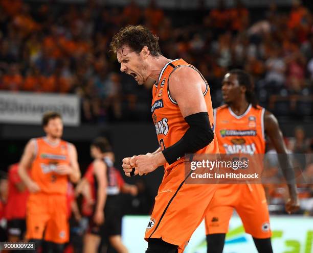 Alex Loughton of the Taipans reacts after scoring a 3 point shot during the round 12 NBL match between the Cairns Taipans and the Perth Wildcats at...