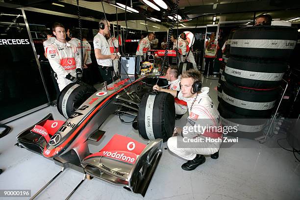 Lewis Hamilton of Great Britain and McLaren Mercedes prepares to drive on his way to taking pole position during qualifying for the European Formula...
