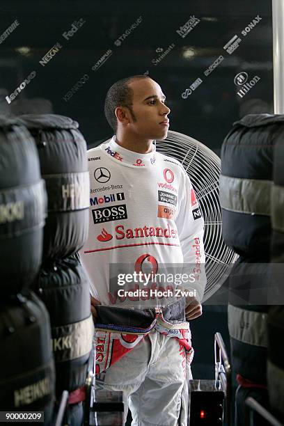 Lewis Hamilton of Great Britain and McLaren Mercedes prepares to drive on his way to taking pole position during qualifying for the European Formula...