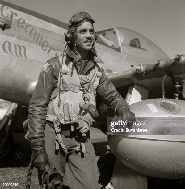 Tuskegee airman Edward C. Gleed of Lawrence, KS, Class 42-K, Group Operations Officer. Includes P-5/D in background, "Creamer's Dream," generally...