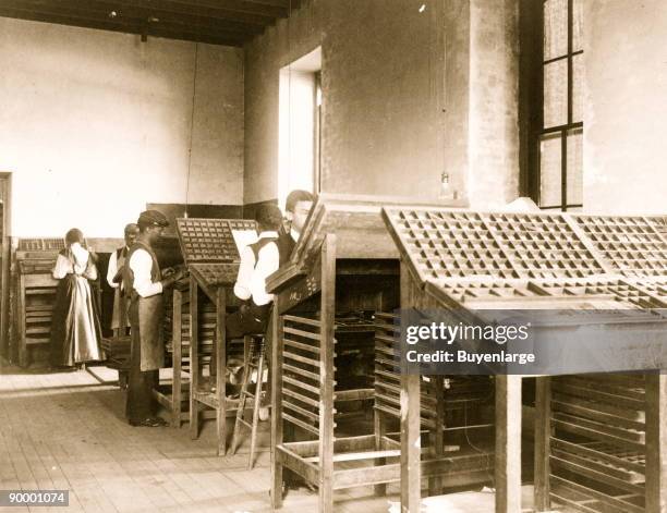 Pressmen at work in printing shop, Hampton Institute, Hampton, Virginia