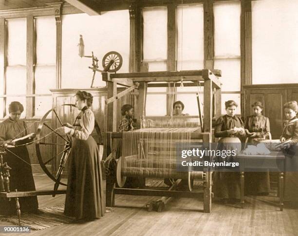 African-American women weaving rug in home economics class at Hampton Institute, Hampton, Va.