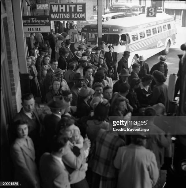 Greyhound bus trip from Louisville, Kentucky, to Memphis, Tennessee, and the terminals. Passengers standing in aisles on Memphis-Chattanooga...