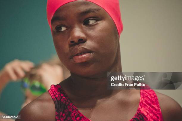 female swimmer at a swim meet. - black girl swimsuit stock pictures, royalty-free photos & images