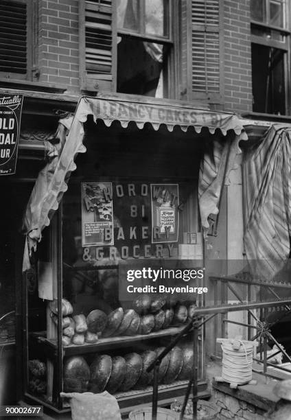 Jewish Bakery "Horowitz" on Lower East Side of New York advertises Fancy Cakes on Its awning and have both Rye Bread and Pumpernickel in the Window