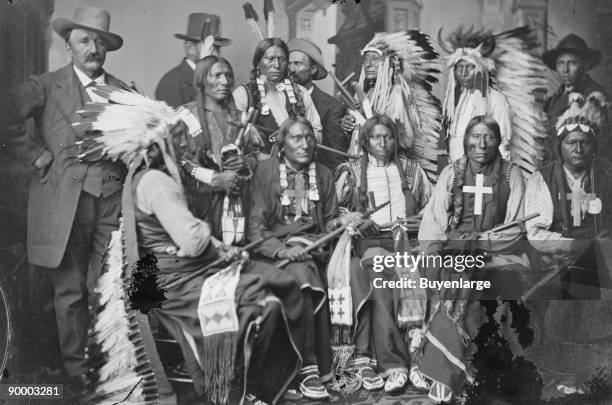 Sioux and Arrapahoe Indian Delegations. L to R Seated - Red Cloud, Big Road, Yellow Bear, Young Man Afraid of his Horses, Iron Crow. L to R Standing...