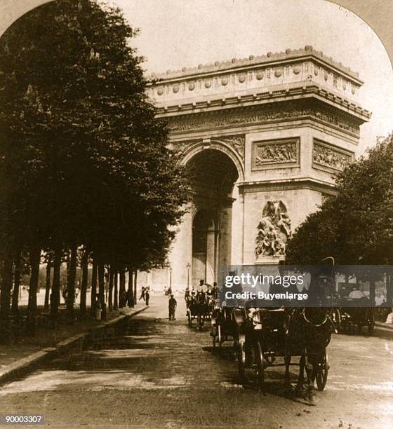 Avenue du Bois and Arc de Triomphe, Paris, France; The Arc de Triomphe is a monument in Paris, France that stands in the centre of the Place Charles...