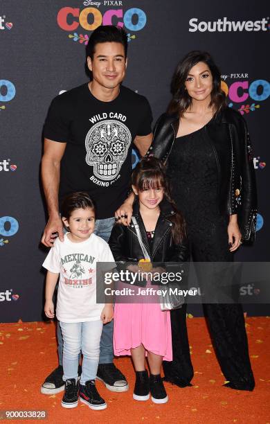 Personality Mario Lopez, son Dominic Lopez, daughter Gia Francesca Lopez and wife Courtney Laine Mazza arrive at the premiere of Disney Pixar's...