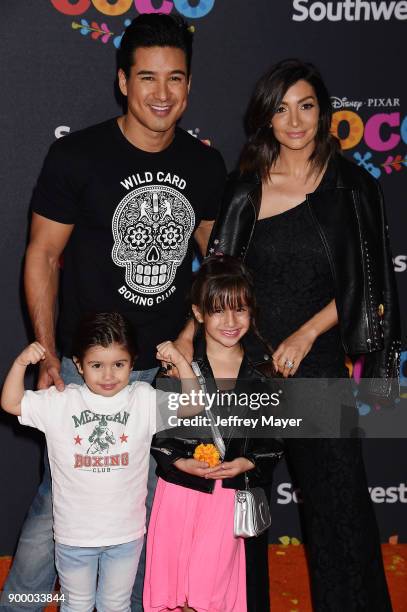 Personality Mario Lopez, son Dominic Lopez, daughter Gia Francesca Lopez and wife Courtney Laine Mazza arrive at the premiere of Disney Pixar's...