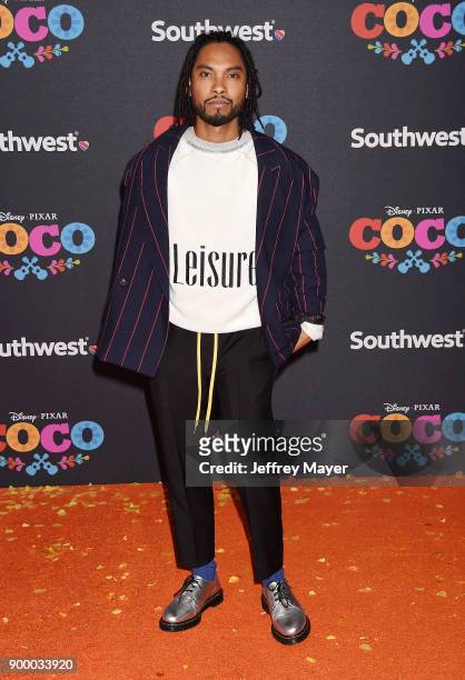 Actor Miguel and guest arrive at the premiere of Disney Pixar's 'Coco' at El Capitan Theatre on November 8, 2017 in Los Angeles, California.