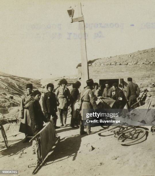 Bicycle stretchers bringing Russian wounded to a surgical station -- siege of Port Arthur