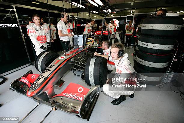 Lewis Hamilton of Great Britain and McLaren Mercedes prepares to drive on his way to taking pole position during qualifying for the European Formula...