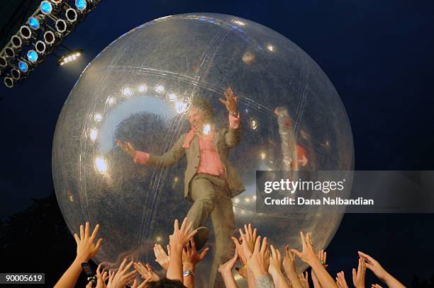 Wayne Coyne of the Flaming Lips performs at the Marymoor Amphitheater on August 21, 2009 in Redmond, Washington.