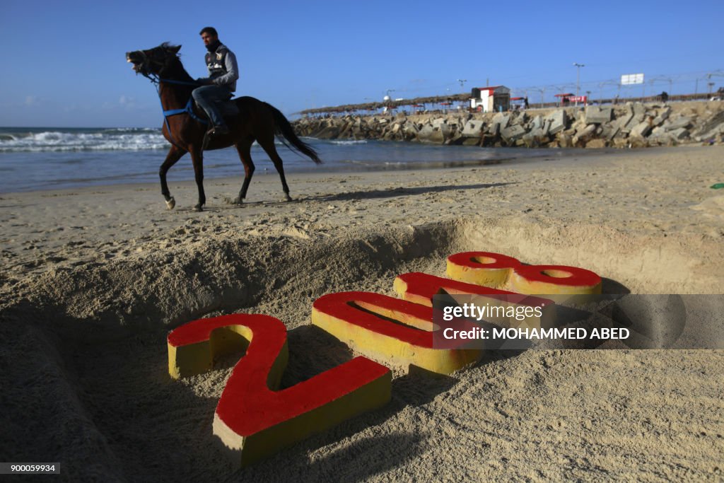 TOPSHOT-PALESTINIAN-GAZA-NEWYEAR