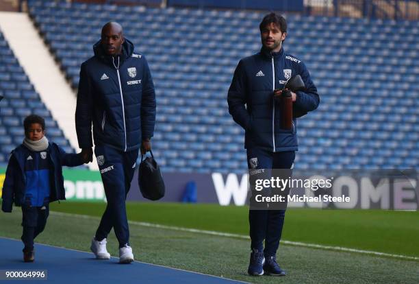 Allan Nyom and Claudio Yacob of West Bromwich Albion arrive prior to the Premier League match between West Bromwich Albion and Arsenal at The...