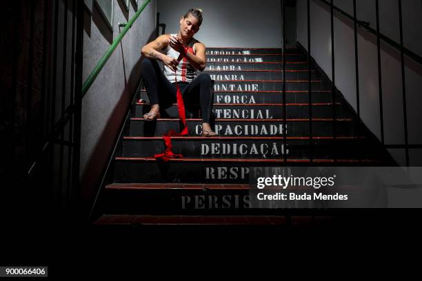 Brazilian UFC flyweight fighter Priscila "Pedrita" Cachoeira prepares to train at School of Lutas Niteroi on December 29, 2017 in Rio de Janeiro,...