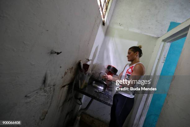 Brazilian UFC flyweight fighter Priscila "Pedrita" Cachoeira prepare your breakfast before another day of training at School of Lutas Niteroi on...