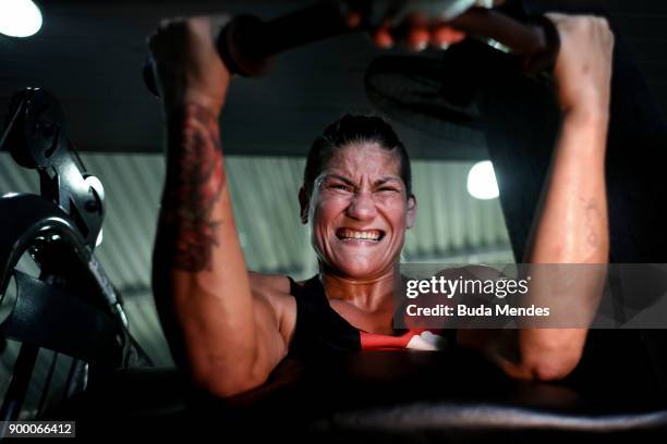 Brazilian UFC flyweight fighter Priscila "Pedrita" Cachoeira trains at gym on December 29, 2017 in Rio de Janeiro, Brazil. The trajectory of the...