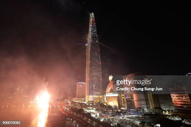 Fireworks go off at the Lotte World Tower on January 1, 2018 in Seoul, South Korea. The Lotte World Tower, the 555 meter-tall skyscraper, is the...