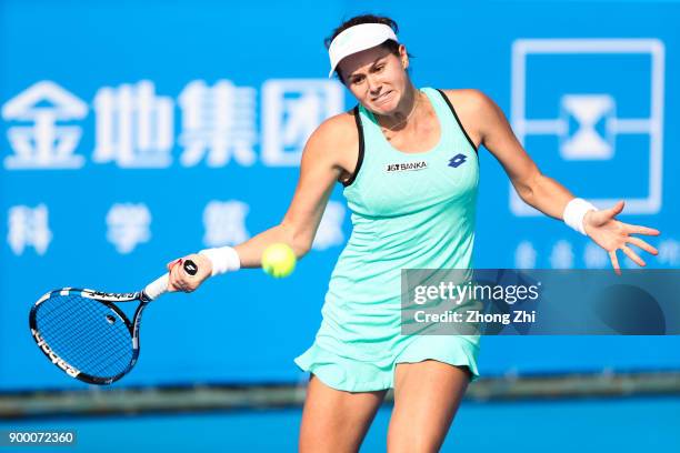 Jana Cepelova of Slovakia returns a shot during the match against Magada Linette of Poland during Day 1 of 2018 WTA Shenzhen Open at Longgang...